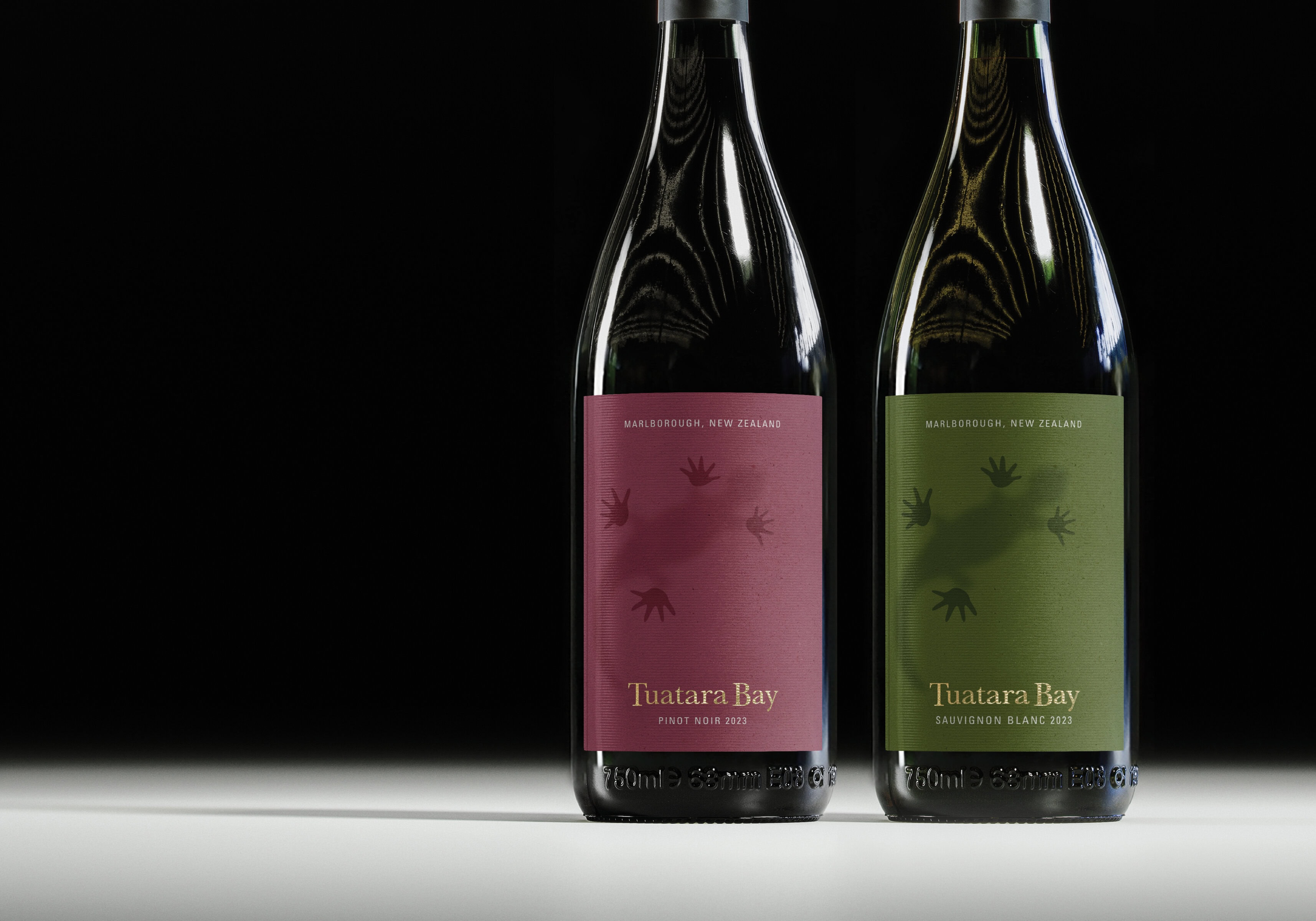 Tuatara Bay_TCM Web A refined label system for Tuatara Bay Marlborough Sauvignon Blanc and Pinot Noir Wine, designed to reflect the grapes, create standout through restraint, texture and confident varietal colour to signal flavours and aroma.